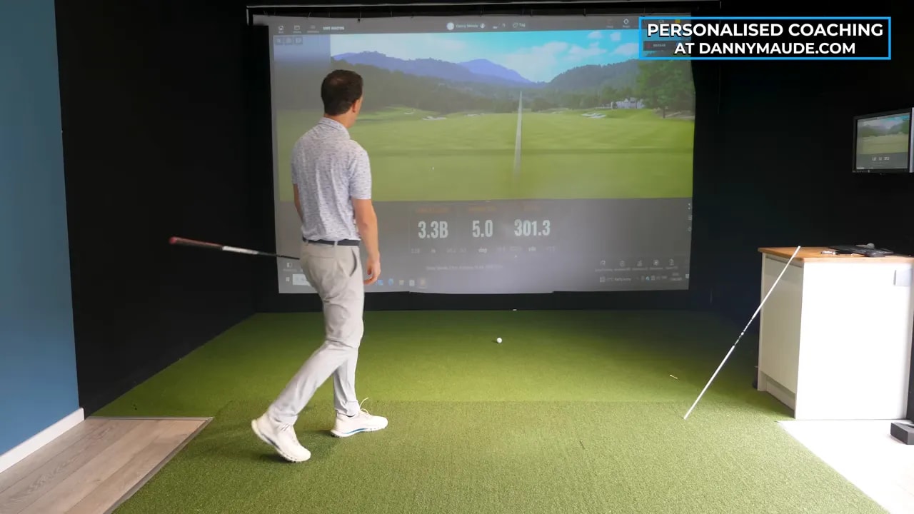 Launch monitor screen with shot numbers displayed including 3.3 right, 5.0 up and 301.3 carry or distance