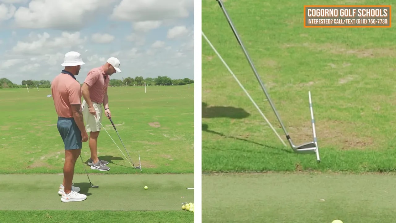 Golfer at address with two alignment sticks creating a path station on the range