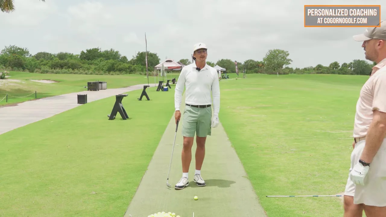 golfer facing camera with text reading feel body moving first