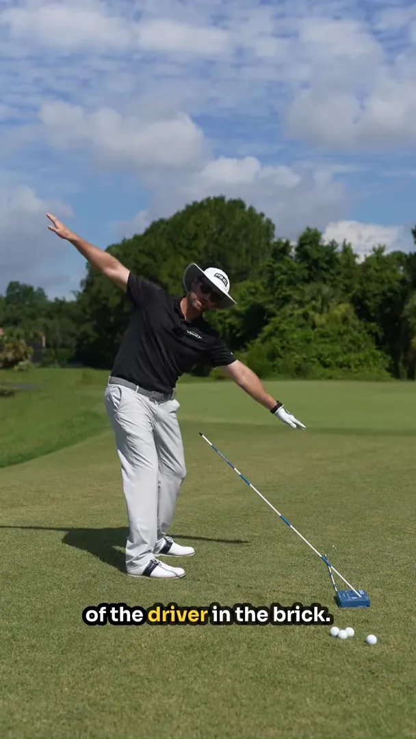 golfer bent in posture with arms extended to match an angled shaft guide