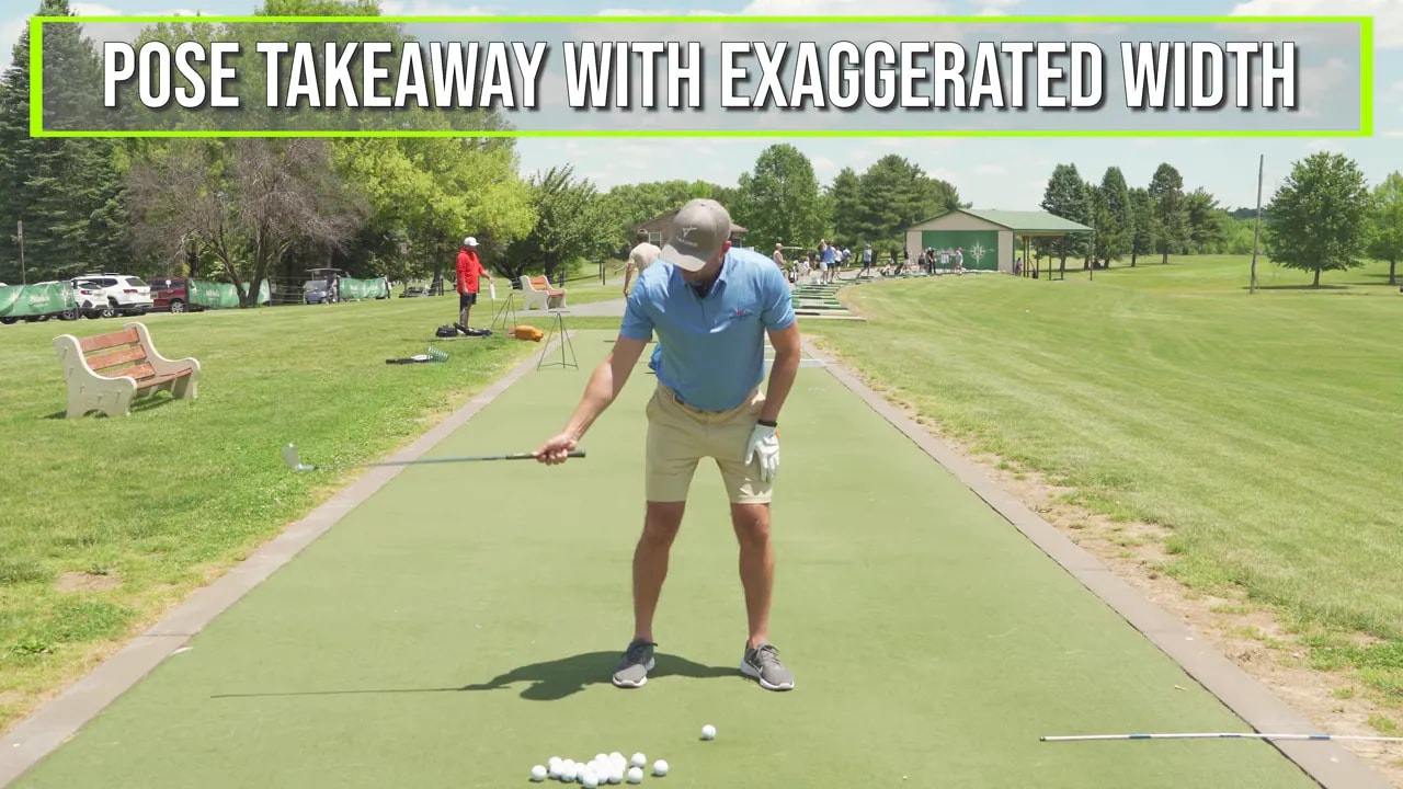 Golfer holding club with trail hand only in a wide takeaway pose with instruction text
