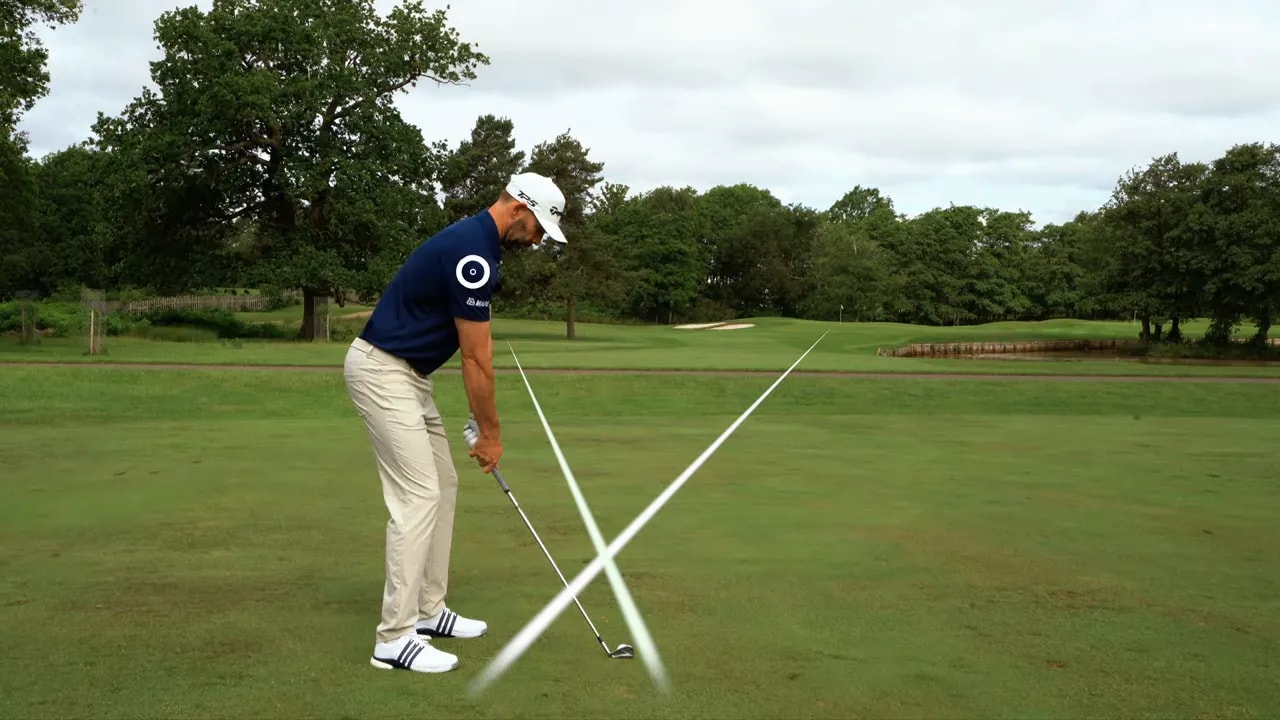 Golfer at address with white lines showing different foot and upper body alignment