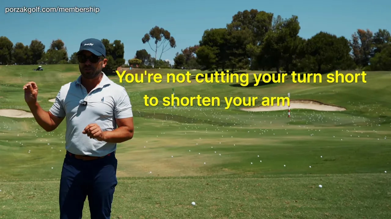Golfer demonstrating that the body turn should not be shortened with the arm swing