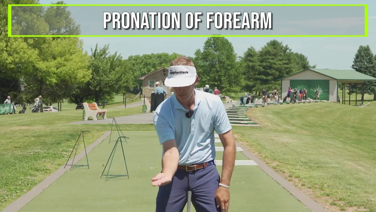 Golfer demonstrating forearm pronation with on-screen text
