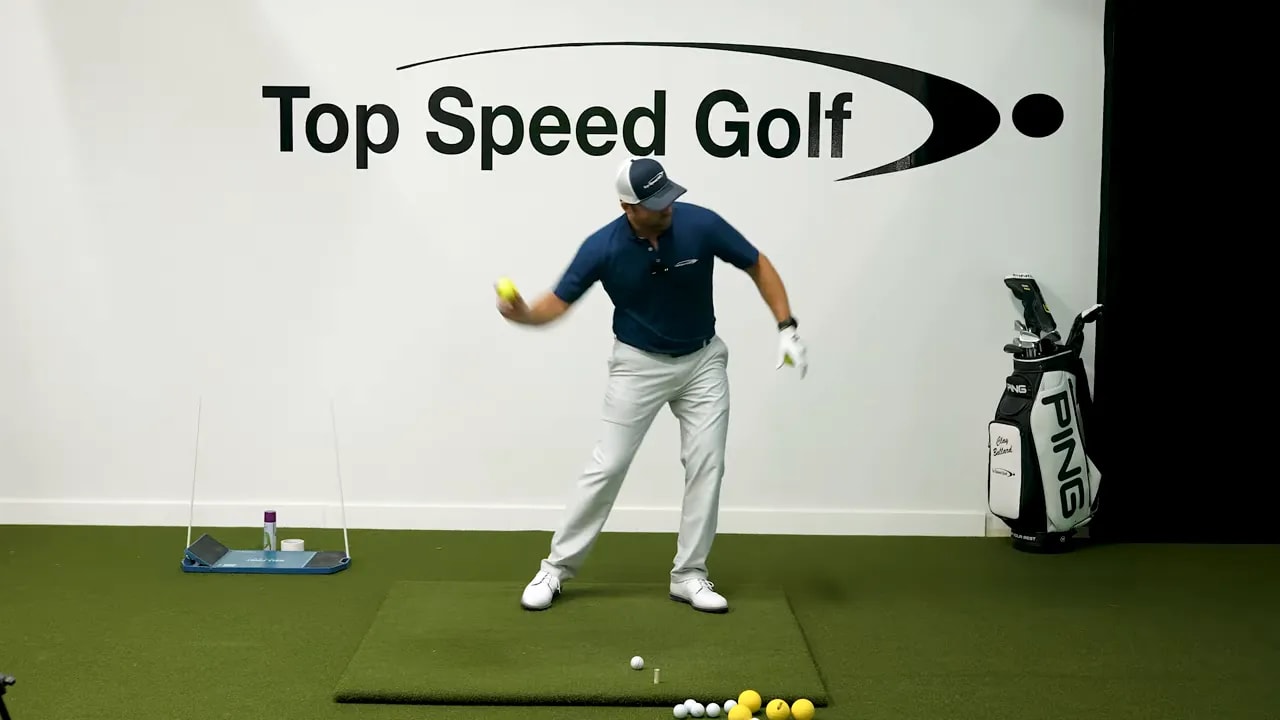 Golfer finishing a tennis ball throwing motion with lead foot forward